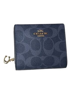 NWOT Coach Navy/Gold
Snap Bifold Wallet Signature
Canvas Limites Edition